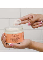كريم تعزيز تجعيد الشعر المجعد من Shea Moisture بجوز الهند والكركديه