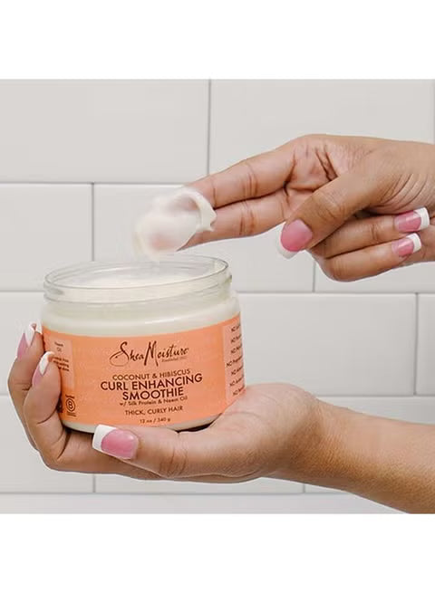 كريم تعزيز تجعيد الشعر المجعد من Shea Moisture بجوز الهند والكركديه