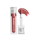 huda beauty - gloss - bombshell