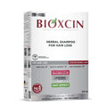 شامبو Bioxcin العشبي – تقوية للشعر الجاف والعادي