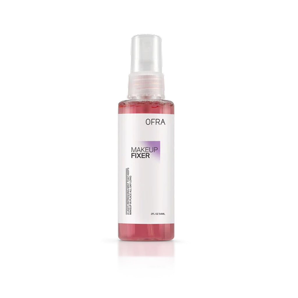 OFRA makeup fixer spray bottle on a white background